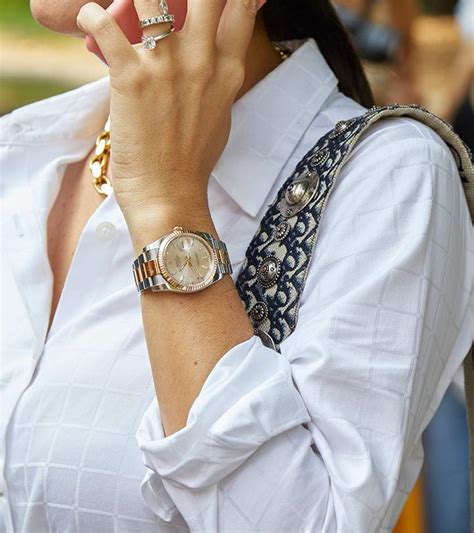 elegant women and rolex and braceltes